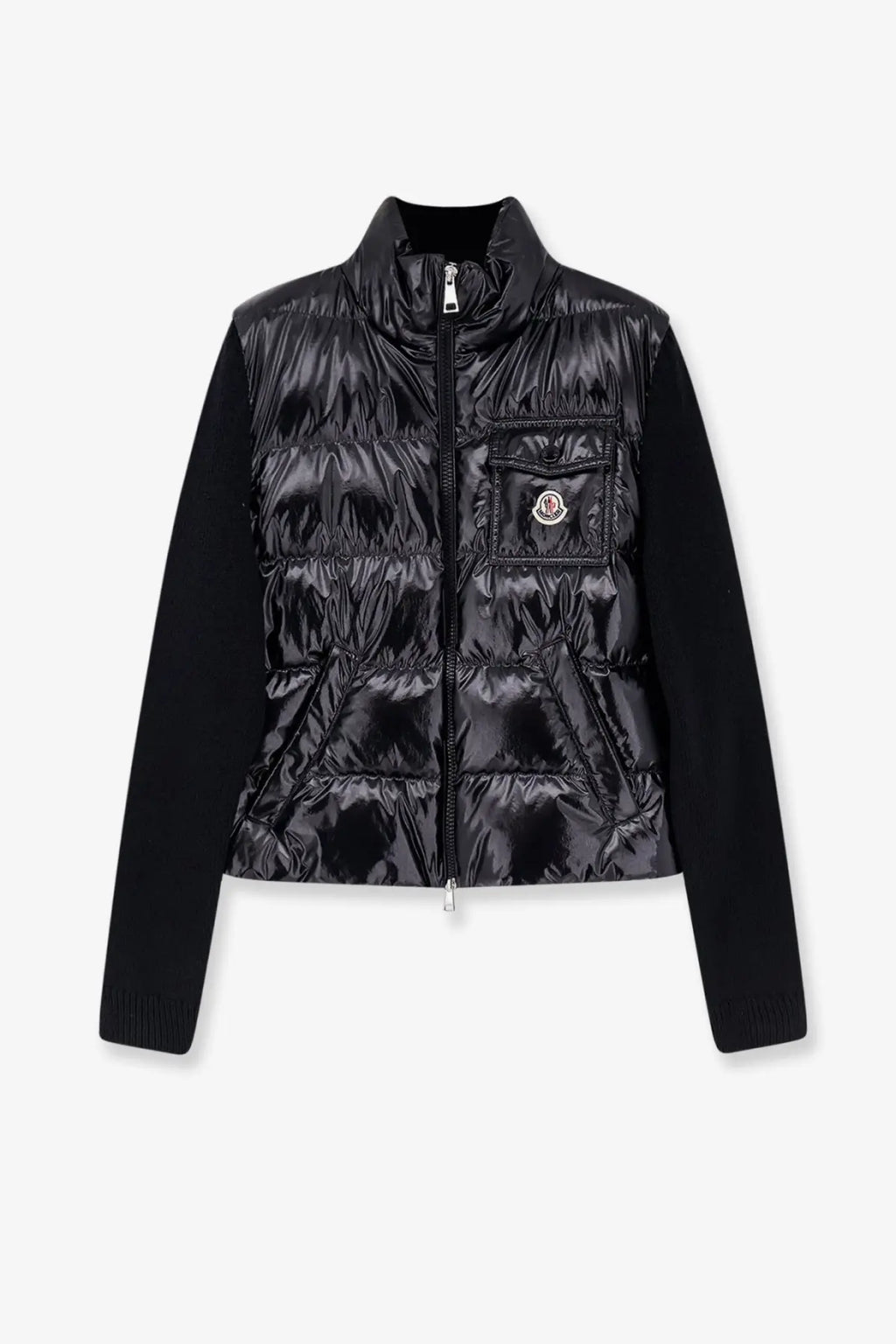 Moncler women’s black down jacket with quilted body, solid knit sleeves, front zipper, and chest pocket patch