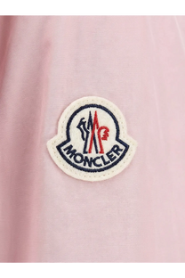 Pink moncler logo patch with embroidered red blue and white details on soft fabric of moncler women fegeos recycled jacket