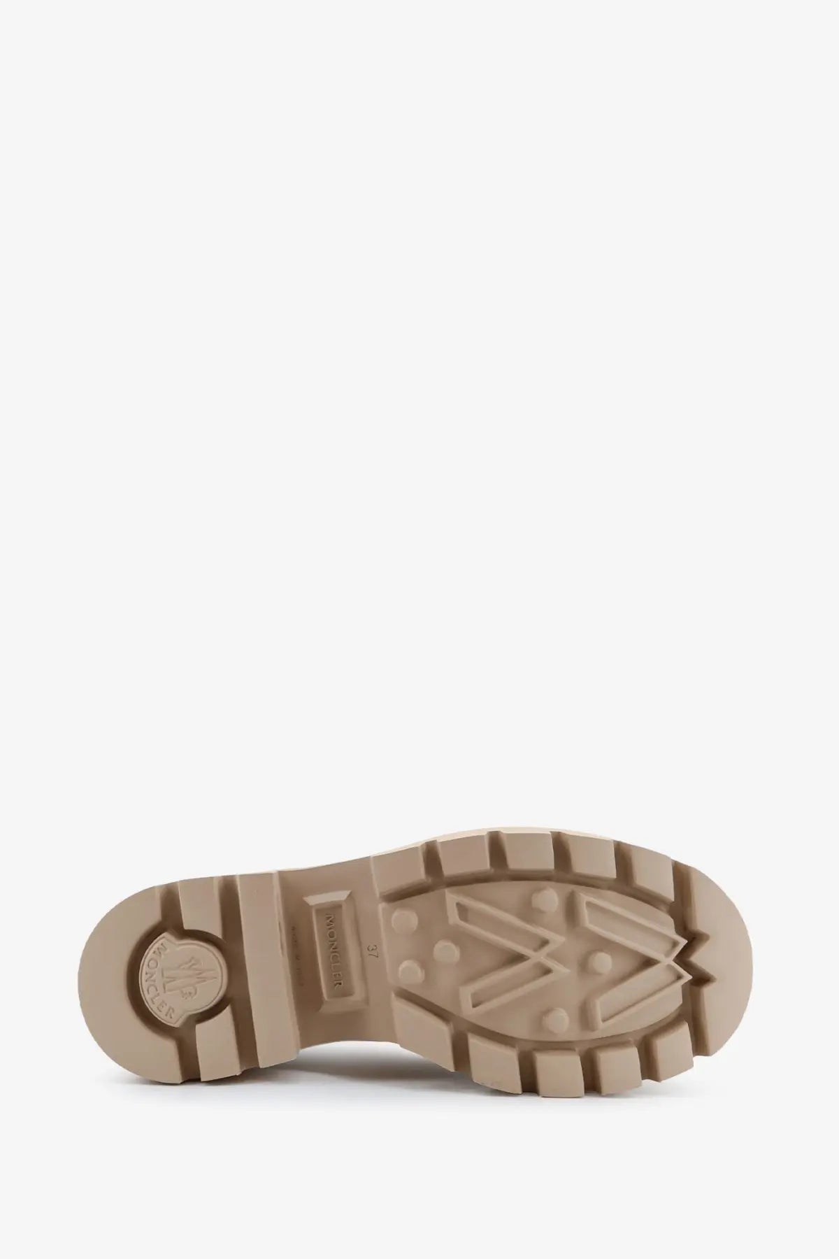 Back view of moncler women’s kickstream beige rubber rainboots featuring a tan rubber sole with chunky tread and embossed logo