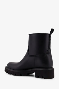 Moncler women’s Kickstream black rubber rainboots with chunky sole and pull tab for easy wear