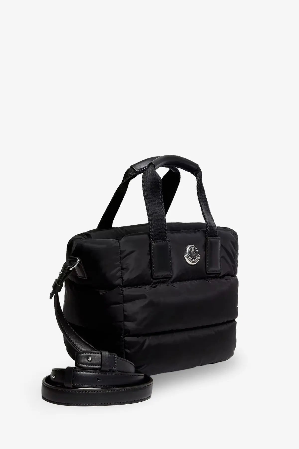 Moncler women’s black nylon caradoc crossbody bag with quilted puffer texture and silver logo emblem on front