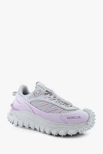 Moncler women’s nylon trailgrip sneaker in light purple and gray with a rugged spiked sole for hiking use