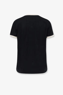 Moncler women’s black organic cotton t-shirt with short sleeves and white ribbed cuffs and neckline