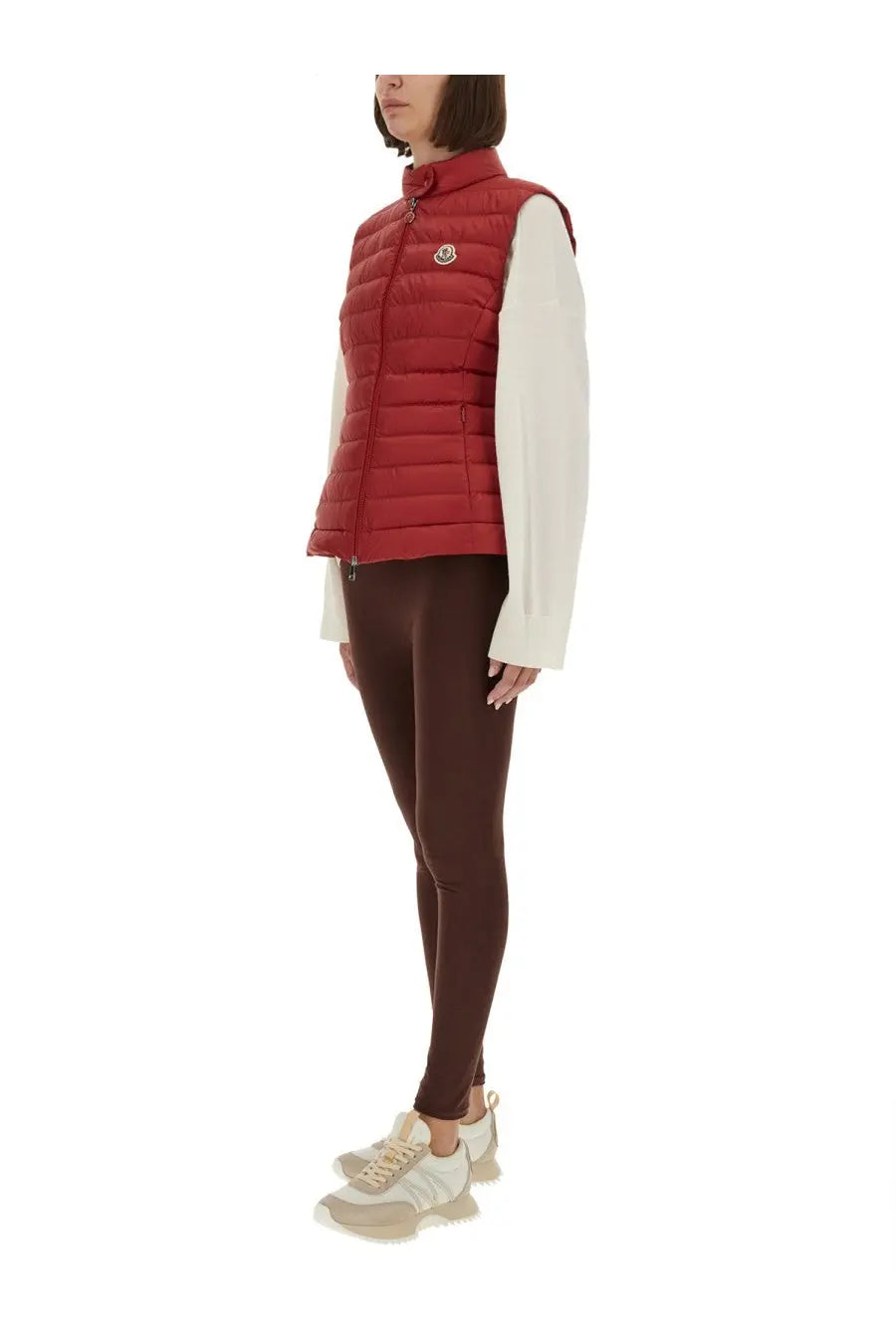 Moncler women’s red quilted padded vest with high collar and logo emblem for stylish warmth and comfort