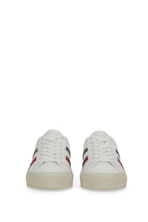 Moncler women’s white leather sneakers with black and red striped accents on the sides