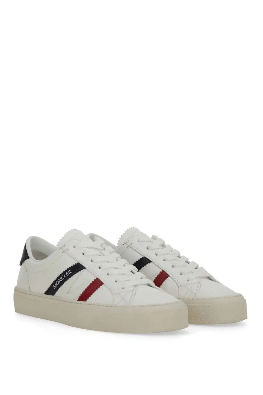 Moncler women’s sneaker white with clean leather upper black and red striped accents and chunky rubber sole