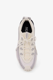 Moncler women’s trailgrip lite3 white sneaker with sleek modern design gray accents and textured mesh upper