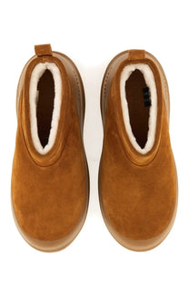 Moon boot unisex beige tan suede ankle boots with plush white shearling lining and chunky brown rubber soles