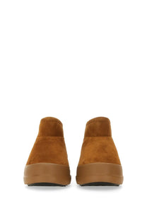 Tan suede slip-on mules with chunky rubber sole from Moon Boot unisex beige collection