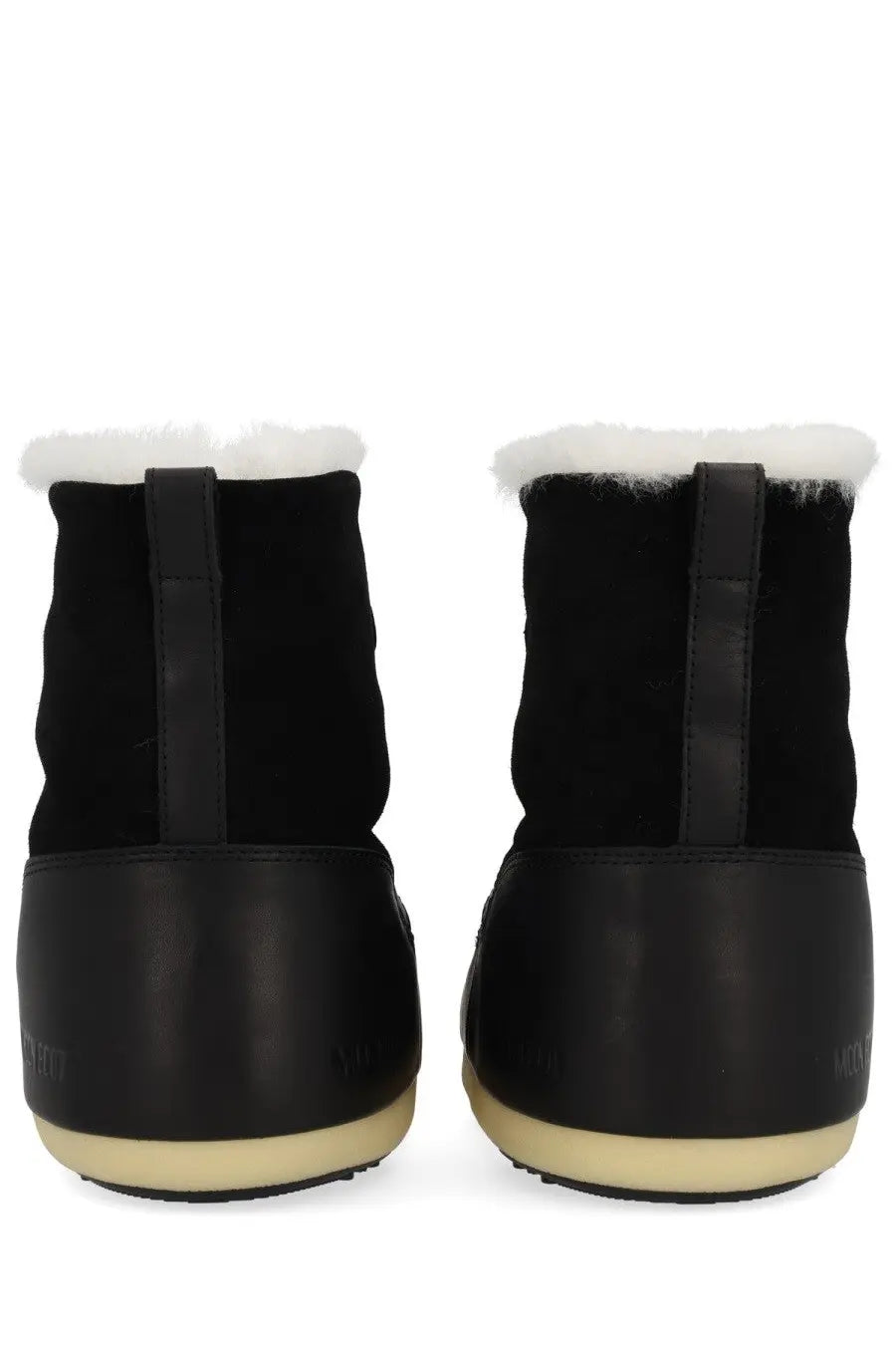 Moon Boot unisex black winter boots with black suede and rubber exterior and white faux fur lining