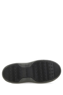 Black rubber sole with textured tread and moon boot branding on the unisex grey moon boot back side