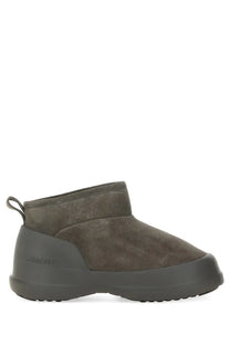 Olive green suede ankle boot with chunky rubber sole and back pull tab from moon boot unisex moon boot grey collection