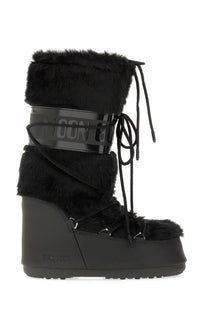 Black moon boot unisex icon boot with plush fur trim and glossy patent leather strap in black