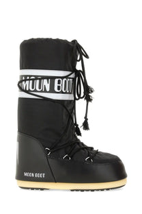 Black moon boot unisex icon boot with white logo band and cream sole for winter and snow wear