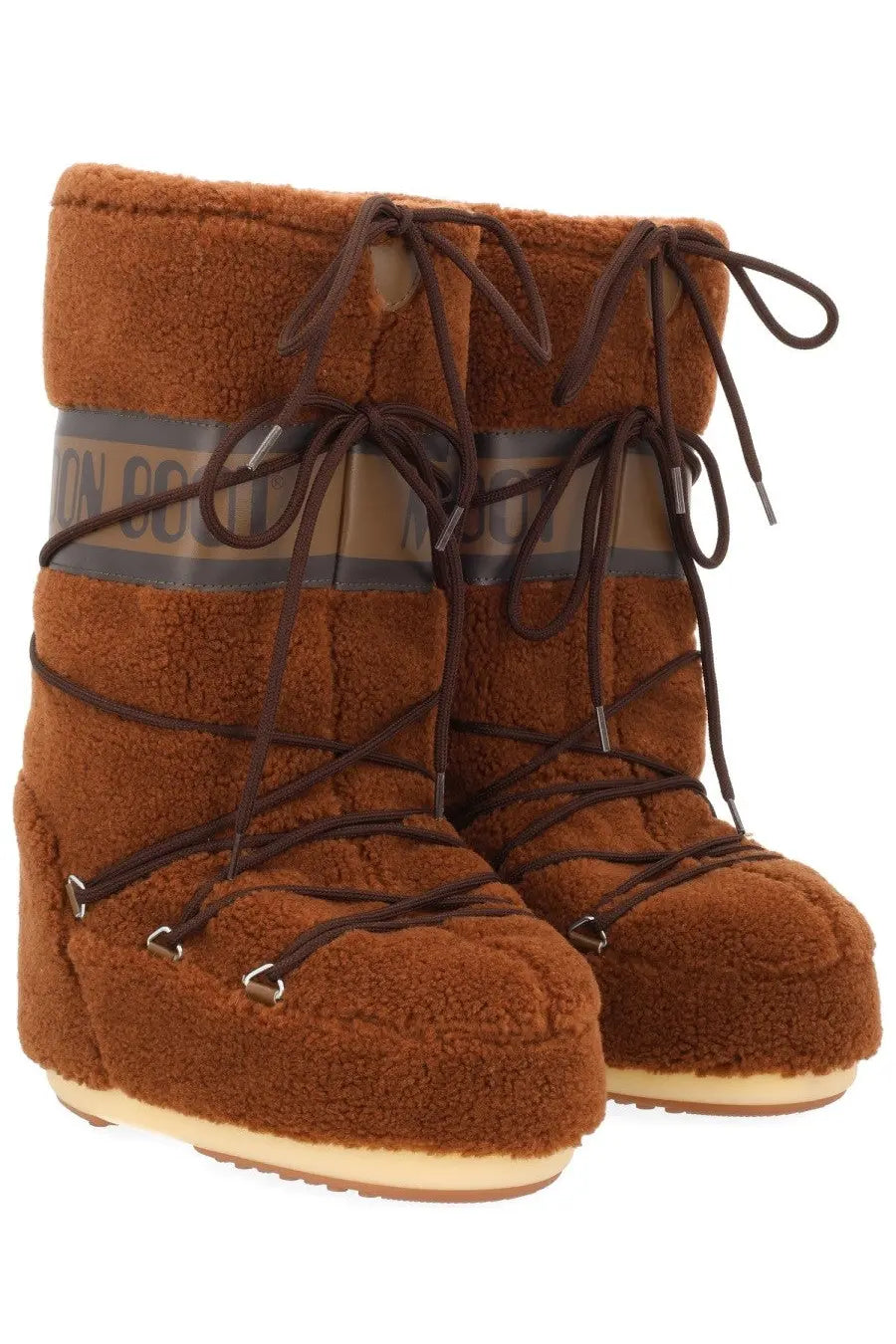 Moon Boot unisex icon boot in brown fuzzy material with dark brown laces and translucent gray band moon boot logo