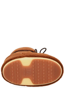 Brown suede moon boot with rubber sole and black laces from moon boot unisex icon boot brown collection