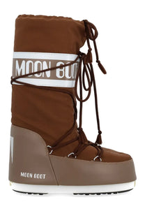 Brown moon boot unisex icon boot with tan lower section white rubber sole and brown laces tied around the shaft