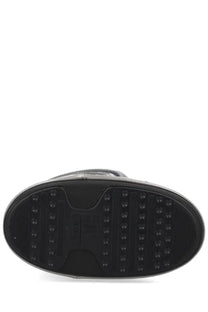 Black rubber sole with textured tread and embossed logo on the moon boot unisex icon glance boot silver