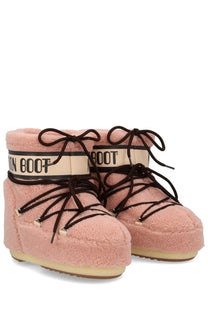 Pink fluffy moon boot snow boots with black laces and cream brand strap in moon boot unisex icon low fleece blue
