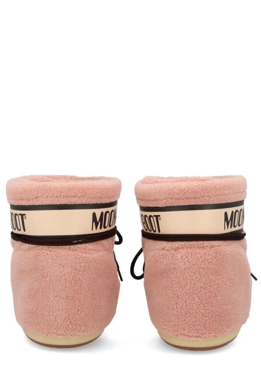 Pink fuzzy moon boot snow boots with black and cream branding bands for cold weather use