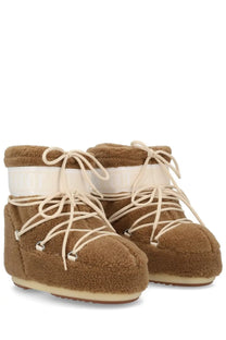 Moon boot unisex icon low fleece boot brown with cream laces and white reflective band around the ankle