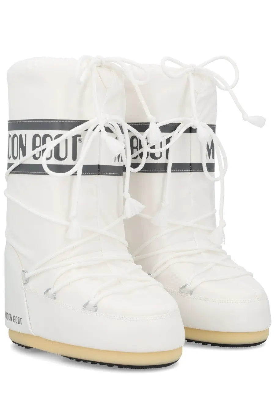 Moon boot unisex icon boot white snow boots with sleek glossy finish and black branding stripes around midsection