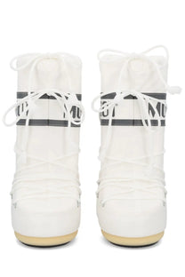 White moon boot unisex icon snow boots featuring black logo stripes and white laces for cold weather use
