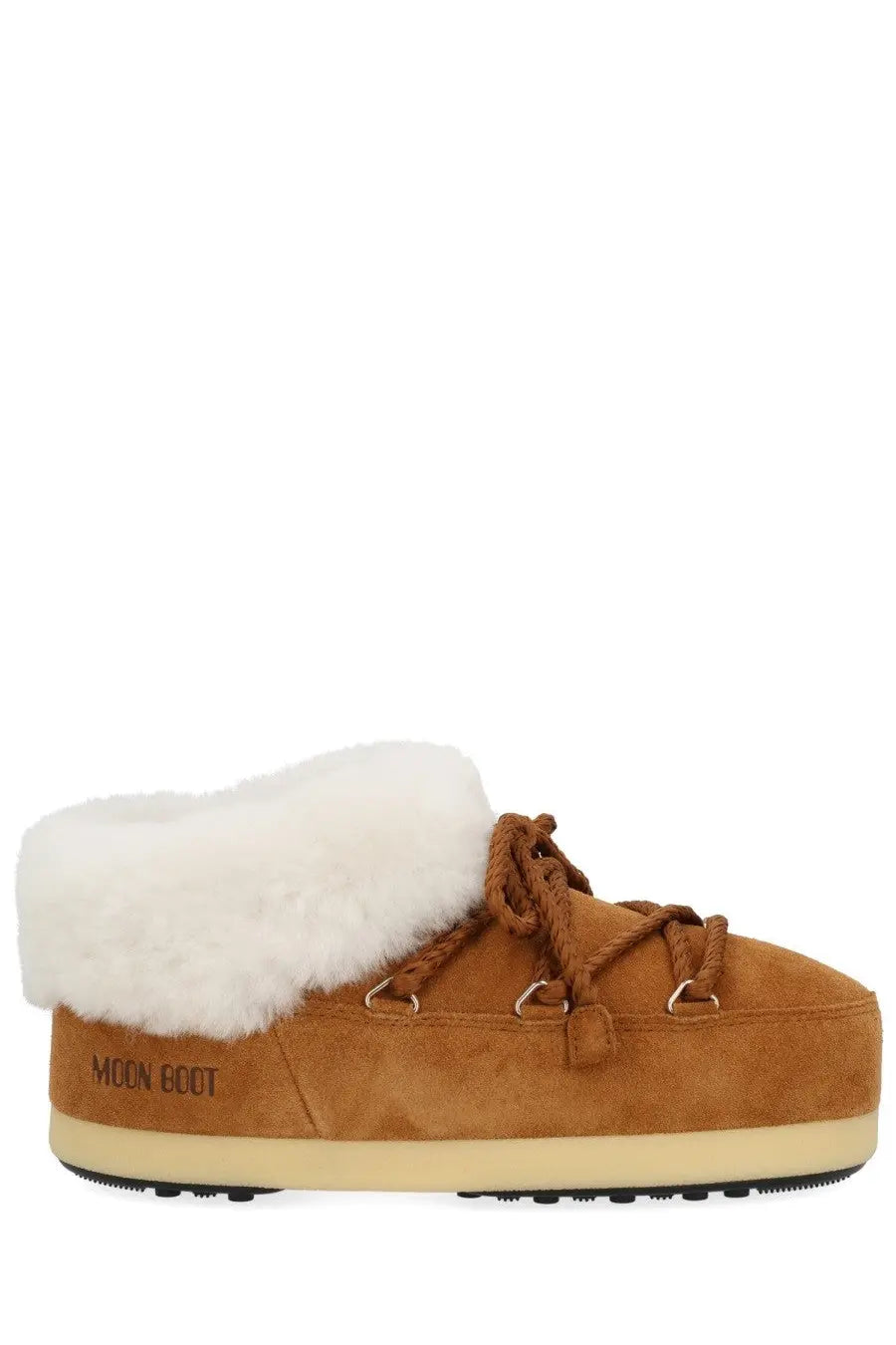 Tan suede moon boot with plush white fur lining and brown laces from moon boot unisex leather evx mules beige collection