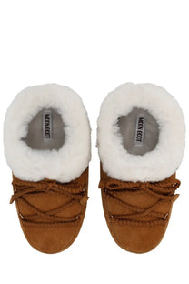 Tan suede moon boot unisex leather evx mules beige with plush white fur lining and braided laces front view