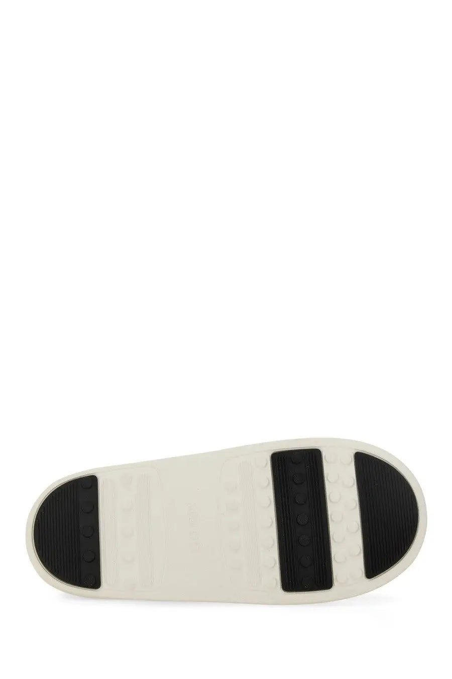 White rubber sole with black textured grip and embossed Moon Boot logo on the unisex park icon sneaker black