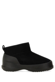 Black suede ankle boot with rubber sole and pull tab from moon boot womens moon boot black product line