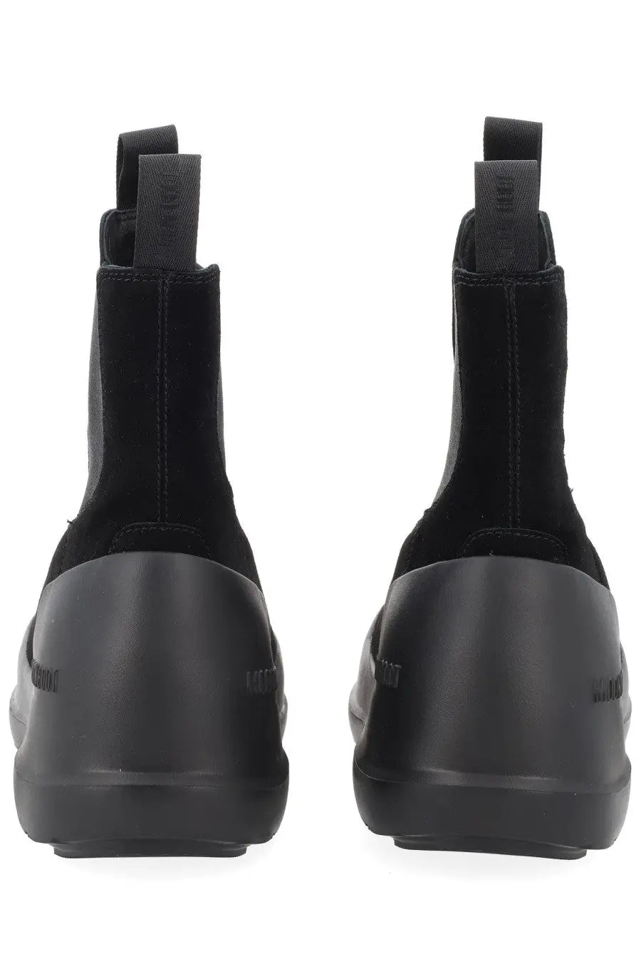 Moon boot women’s chelsea boot moon black showing the back with black suede, chunky rubber sole, and pull tabs