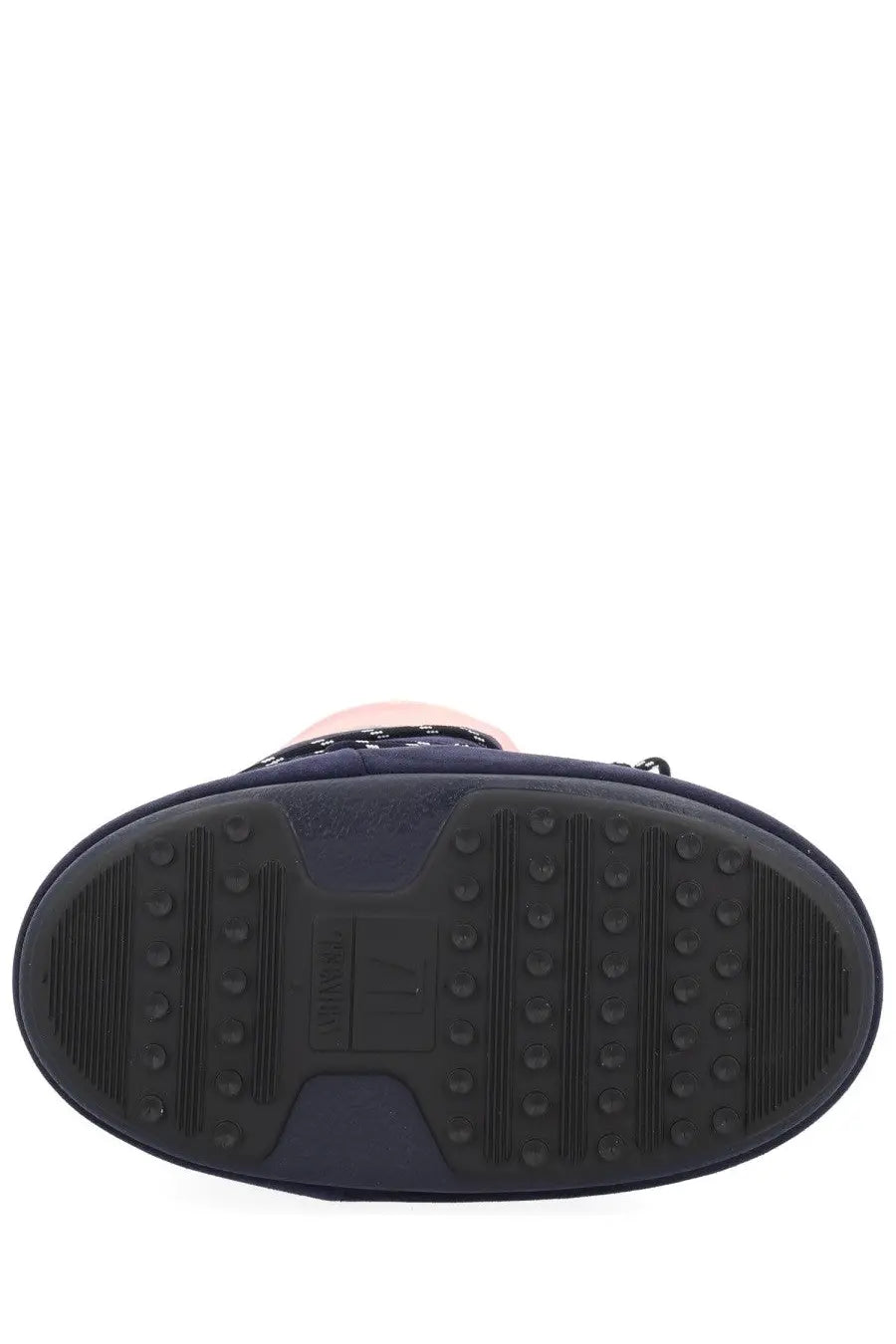 Navy blue rubber sole with textured grip pattern and embossed logo on Moon Boot women’s guest in residence boot