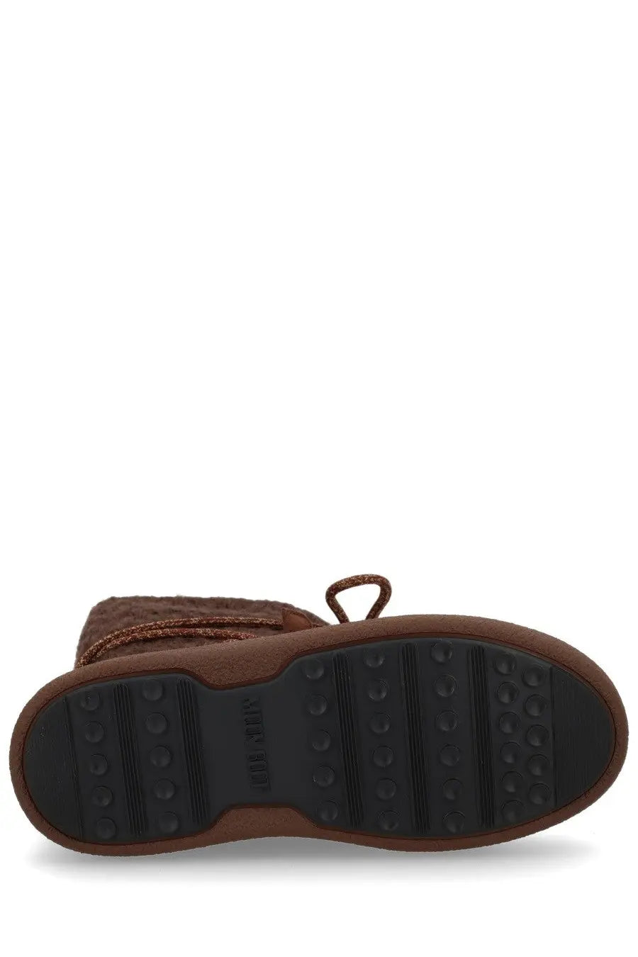 Brown suede moon boot with textured upper and black rubber sole from moon boot guest in residence collection