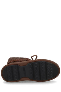 Brown suede moon boot with textured upper and black rubber sole from moon boot guest in residence collection