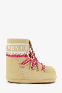 Cream-colored suede moon boot with pink and white woven laces from moon boot women’s icon low suede boots yellow collection