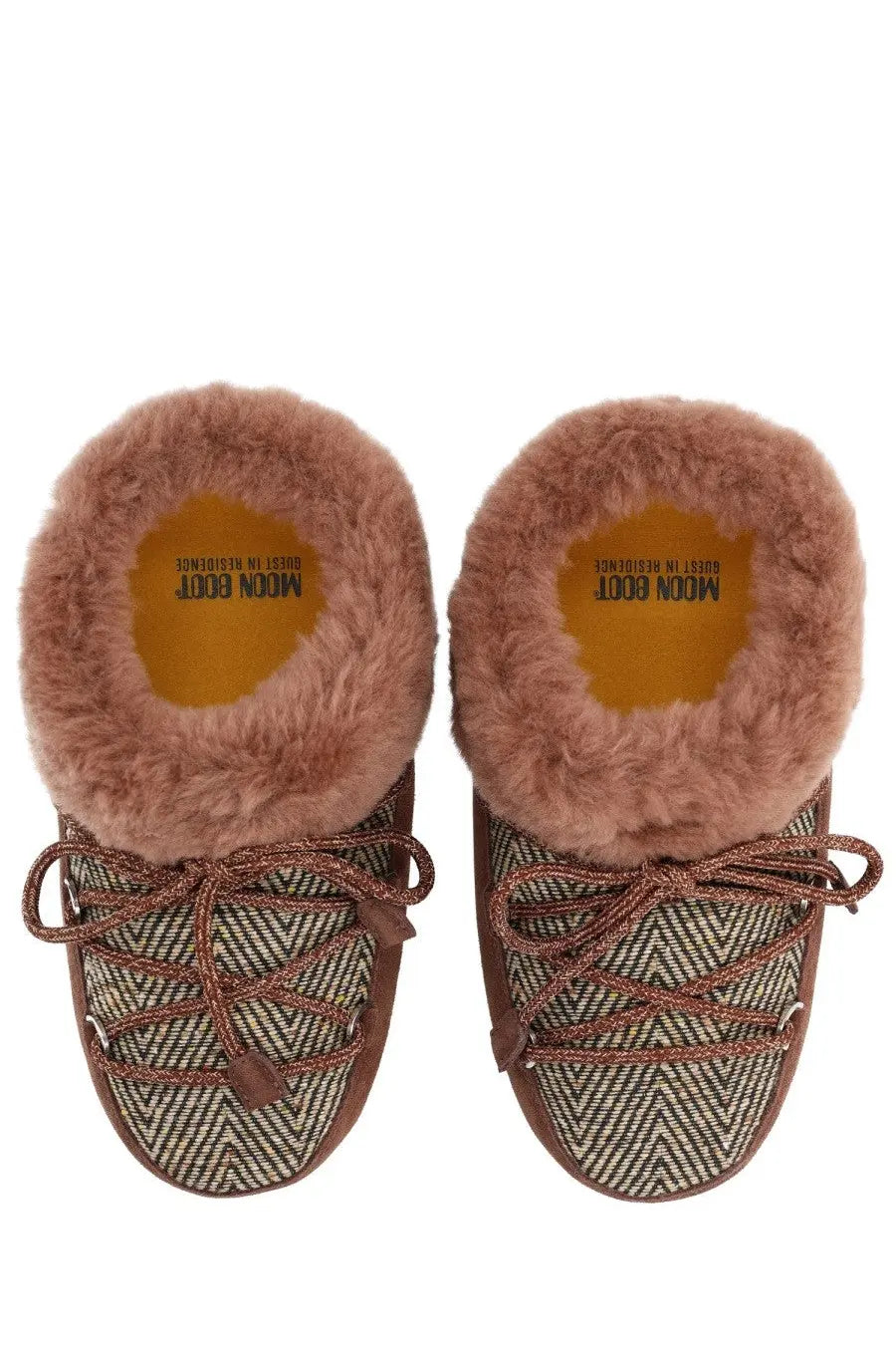 Brown herringbone moon boot women’s boot mule with plush lining and matching lace-up ties for indoor use