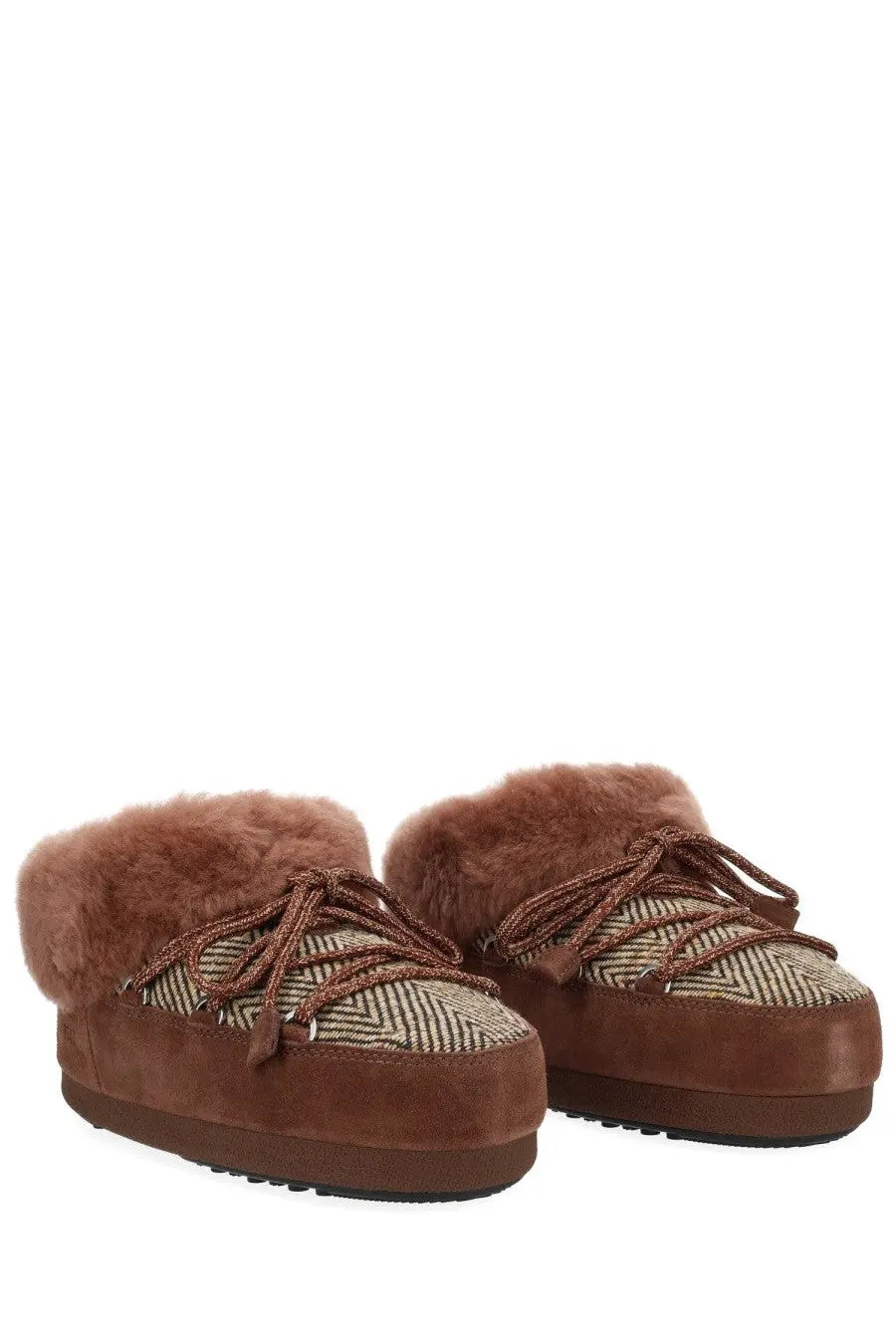 Brown suede moon boot women’s boot mule with herringbone upper and plush faux fur lining for cozy wear