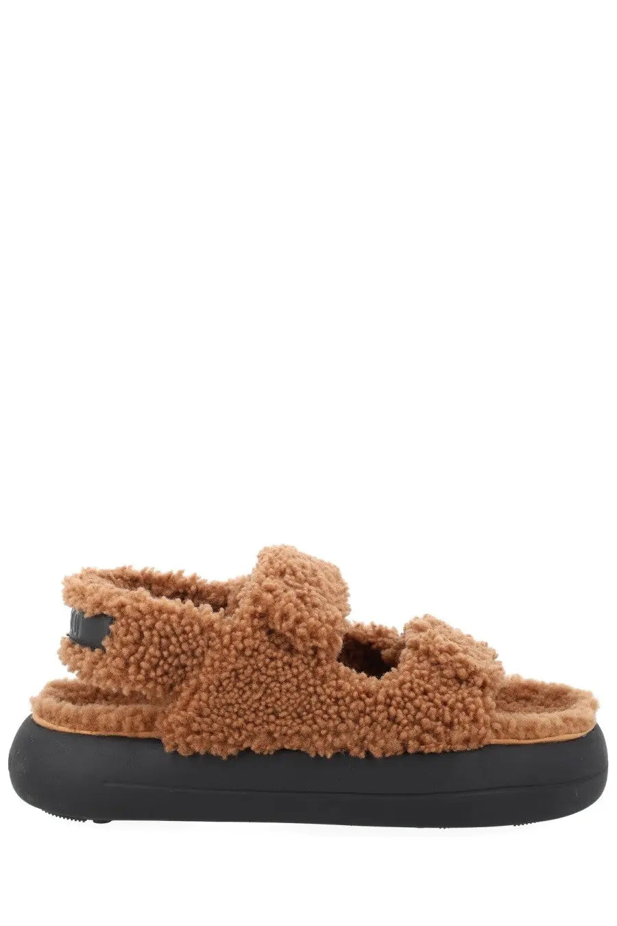 Moon Boot women’s shearling sandal in brown tan with black rubber sole and adjustable strap shown from back side