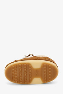 Moon boot women’s shearling and suede slip in brown suede with tan rubber sole and white shearling lining