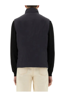 MooRER men’s Senio Skt vest in navy blue quilted fabric worn over black long-sleeved shirt front view