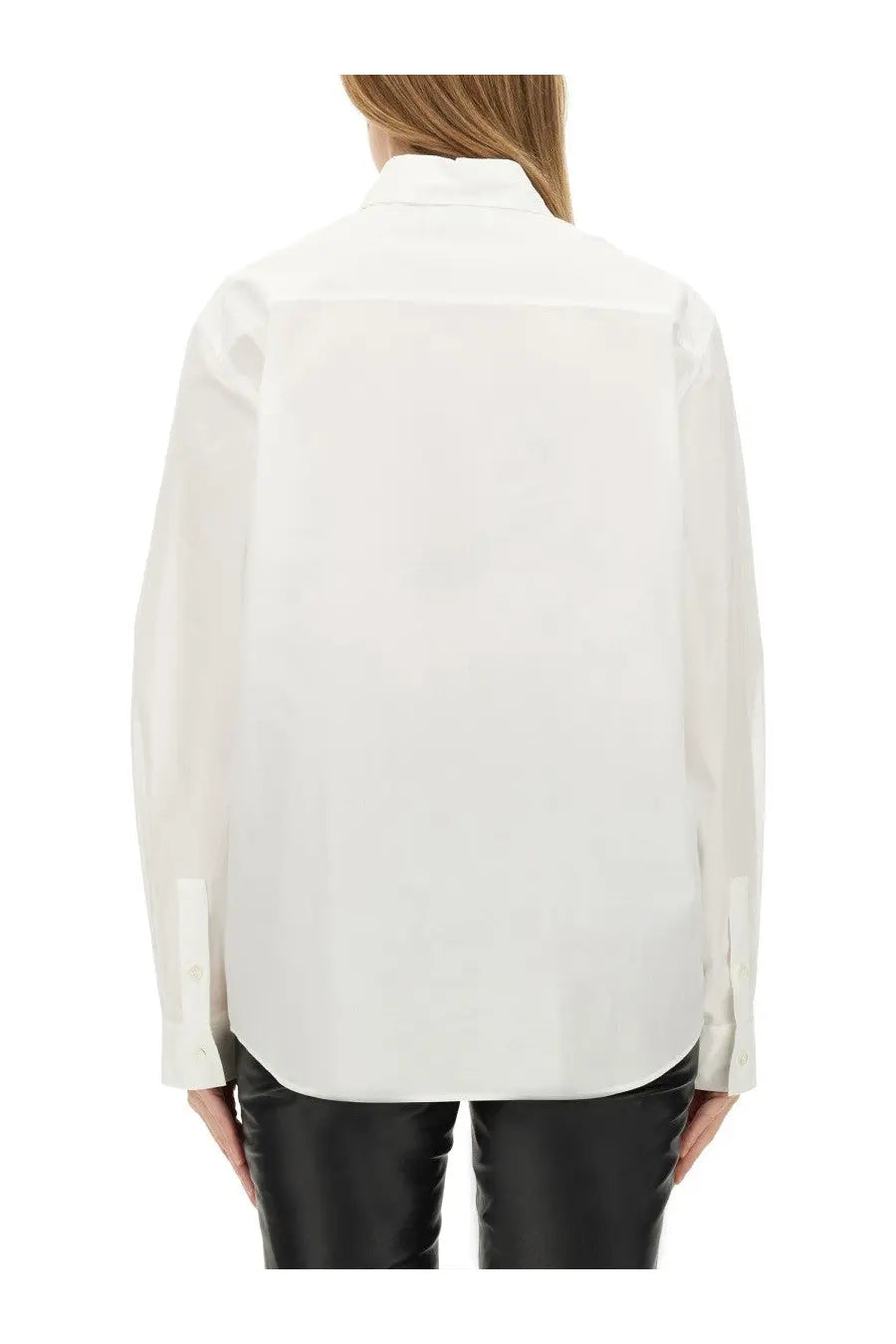 A crisp white moschino jeans womens cotton shirt with long sleeves classic collar and subtle back pleats shown from the back