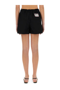 Black moschino jeans women’s cotton shorts with elastic waistband and branded patch on the back side