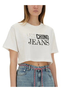 Moschino Jeans women’s white cropped t-shirt with black chino jeans lettering and stars graphic on front