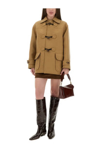 Tan wool Moschino Jeans women’s duffle jacket with black toggle closures and flap pockets in beige