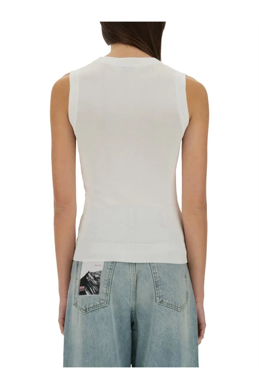 White sleeveless knit top by moschino jeans featuring a simple fitted silhouette in a soft knit fabric