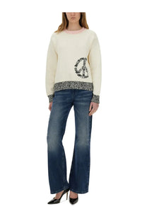 Cream-colored knit sweater with black sequined peace sign and textured gray cuffs from Moschino Jeans women’s mesh white collection