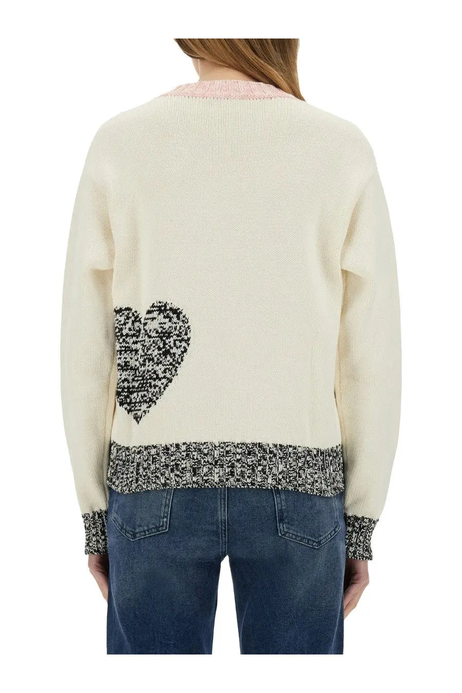 Back view of cream-colored moschino jeans women’s mesh sweater with black and white heart patch and pink ribbed trim