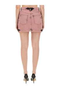 Moschino Jeans women’s blue denim mini skirt with pink fabric and black distressed accents at waistband and hem