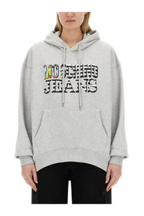 Moschino jeans women’s grey sweatshirt with heathered fabric and bold colorful lettering across the chest